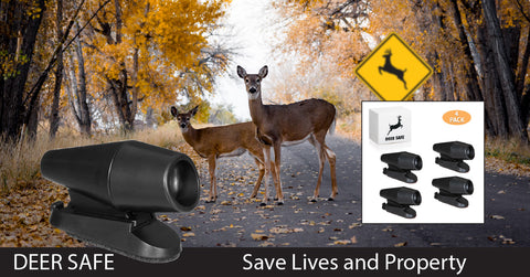 Image of 2 deer standing on road with fall colors, Deer Safe deer whistle in the foreground.