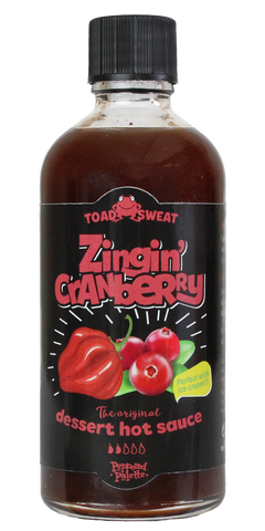 Toad Sweat Zingin' Cranberry glass bottle of hot sauce