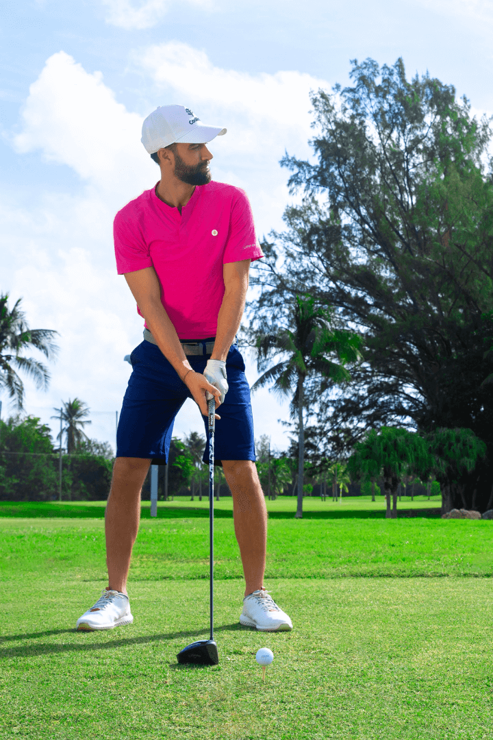 Man golfing in Erodym Golf Shirt