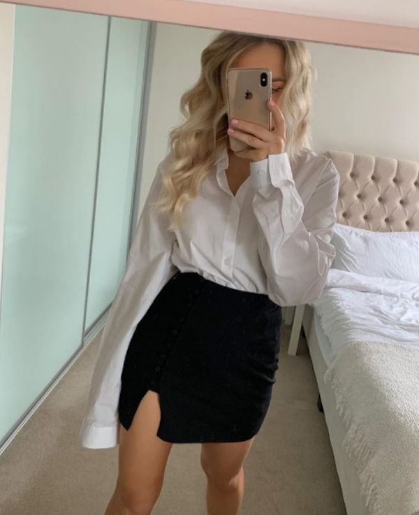 Ginger Girl Smiles In A White Shirt And Black Skirt With A Stylish Hairstyle  Emotional Portrait Of A Teenage Girl Stock Photo  Download Image Now   iStock