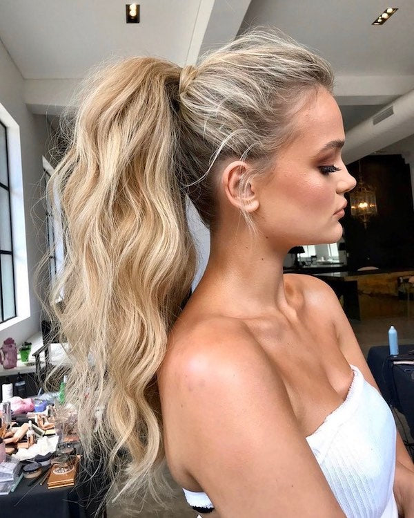 Christmas party hairstyles blonde halo hair extensions ponytail