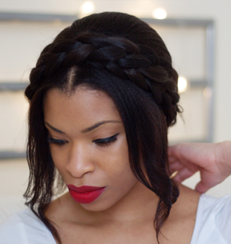 black woman with halo braided hairstyle for bridemaids and brides