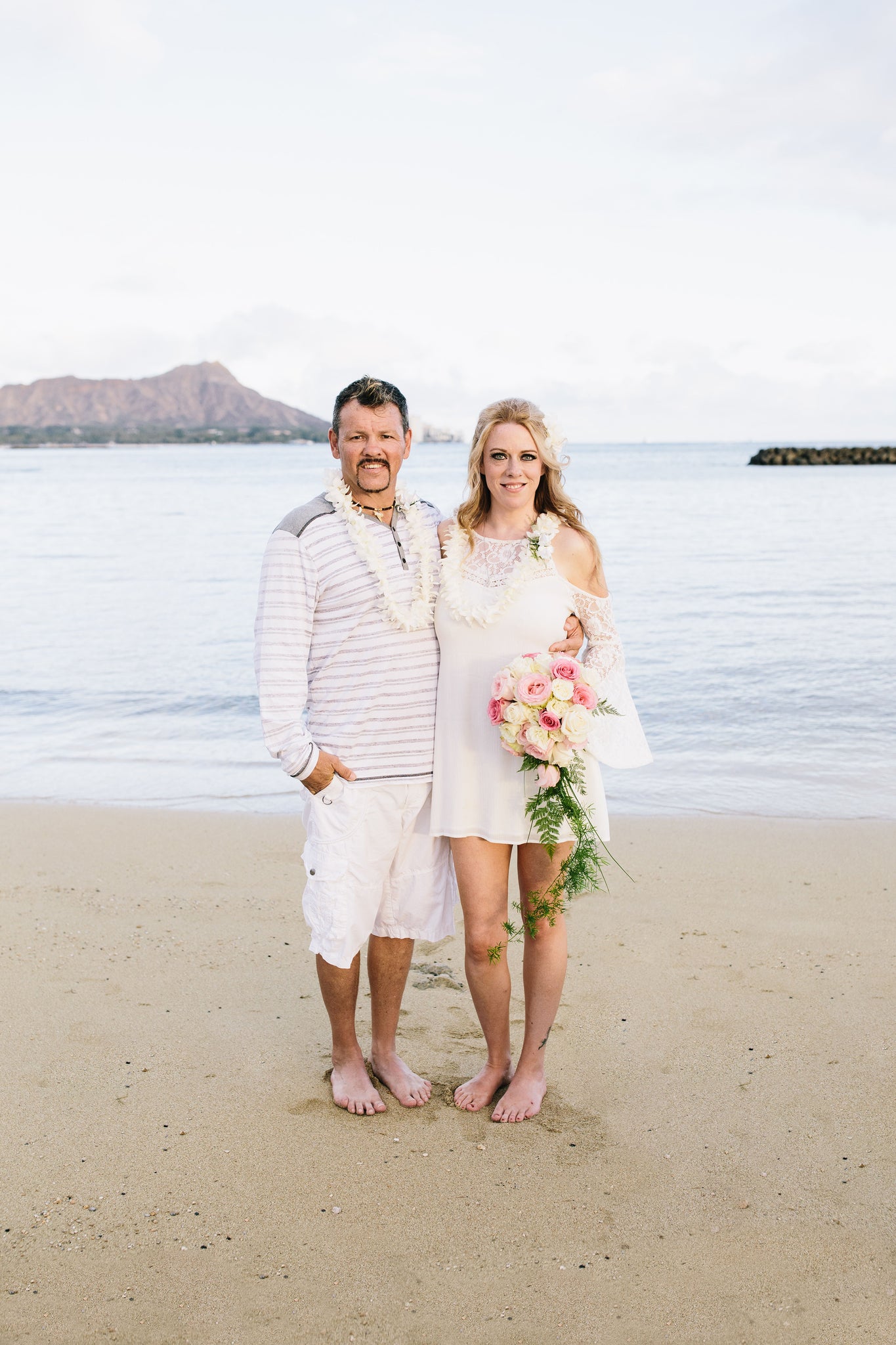 Bride and Groom Marry on Duke Kohanamoku Beach in Waikiki, Oahu, Hawaii