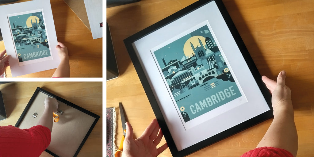 This image shows the end result of the framing lesson. The Cambridge travel print is now framed in a black frame.