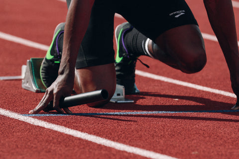 athlete preparing to start running