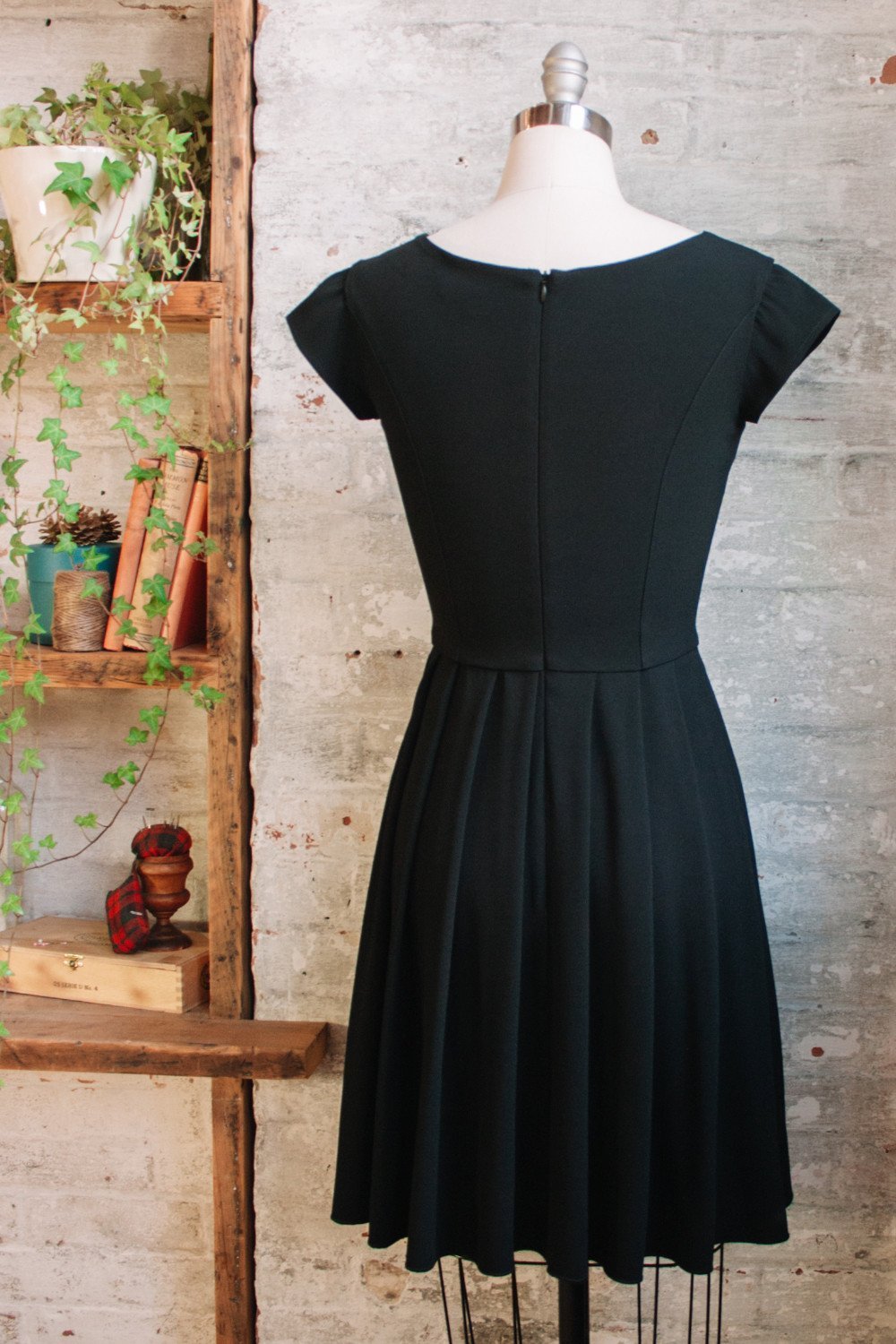 Knee Length Black Pleated Dress with Cap Sleeves | Womens