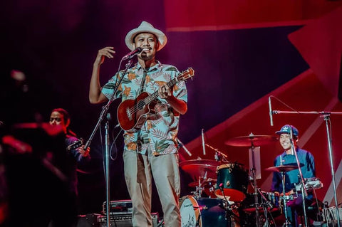 Singto Numchok on stage with his Mainland ukulele