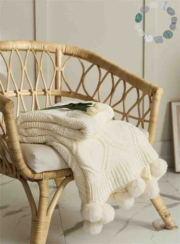 Intricate Knitted Design: The delicate knitted pattern adds depth and character to the blanket, making it a stunning decorative accent for any room.