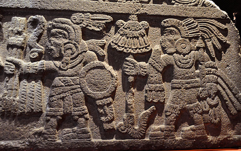Aztec stone carving used as inspiration for Jose Luis's custom wedding ring by Takayas