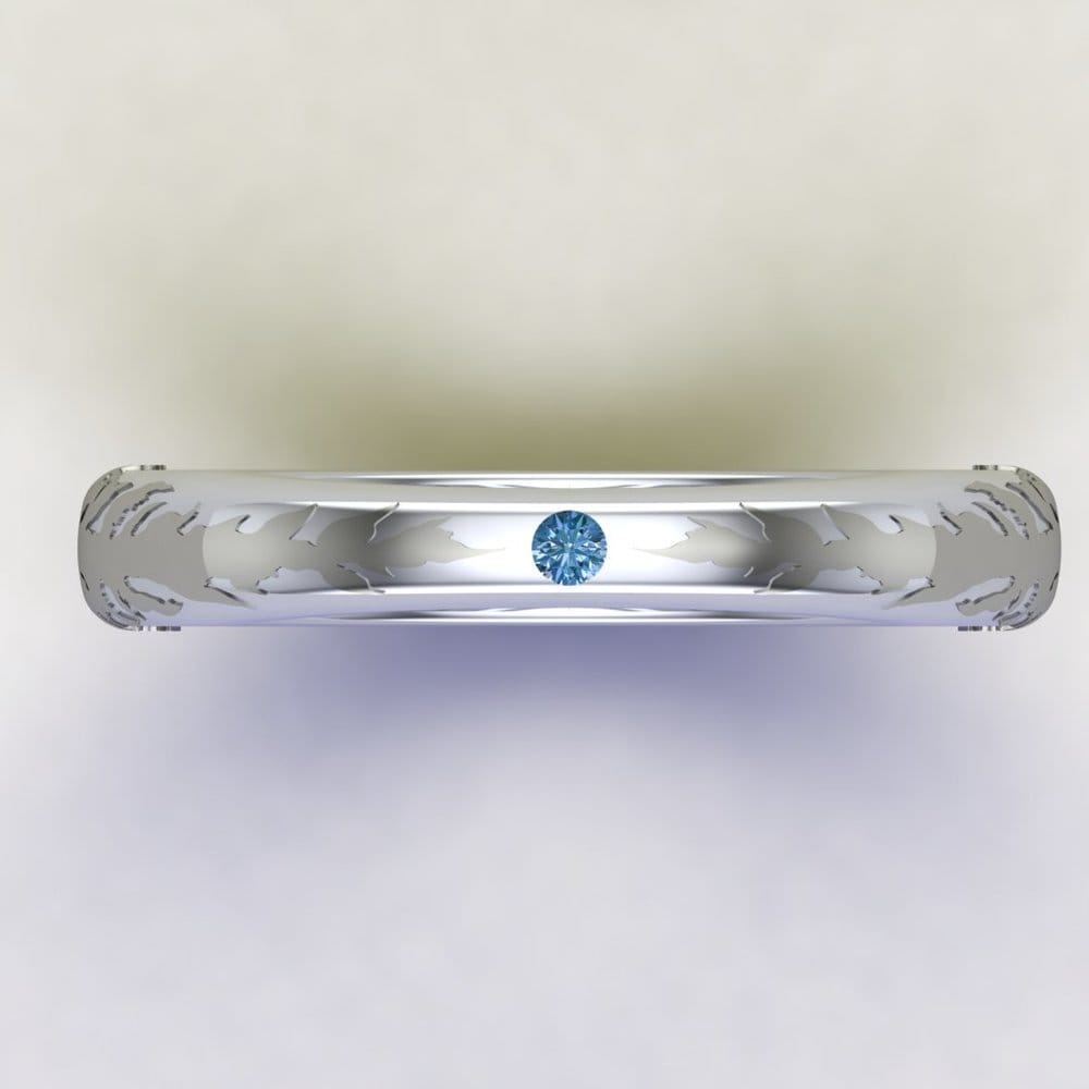 CAD rendering showing top view of the ring – raised flower detail is rendered darker to make it easier to see