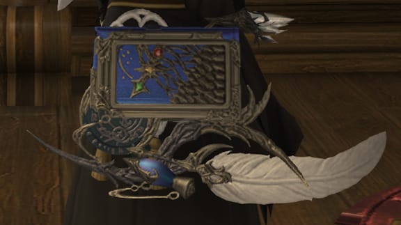 Infi's FFXIV Scholar character's book weapon, used as inspiration for her custom engagement ring by Takayas
