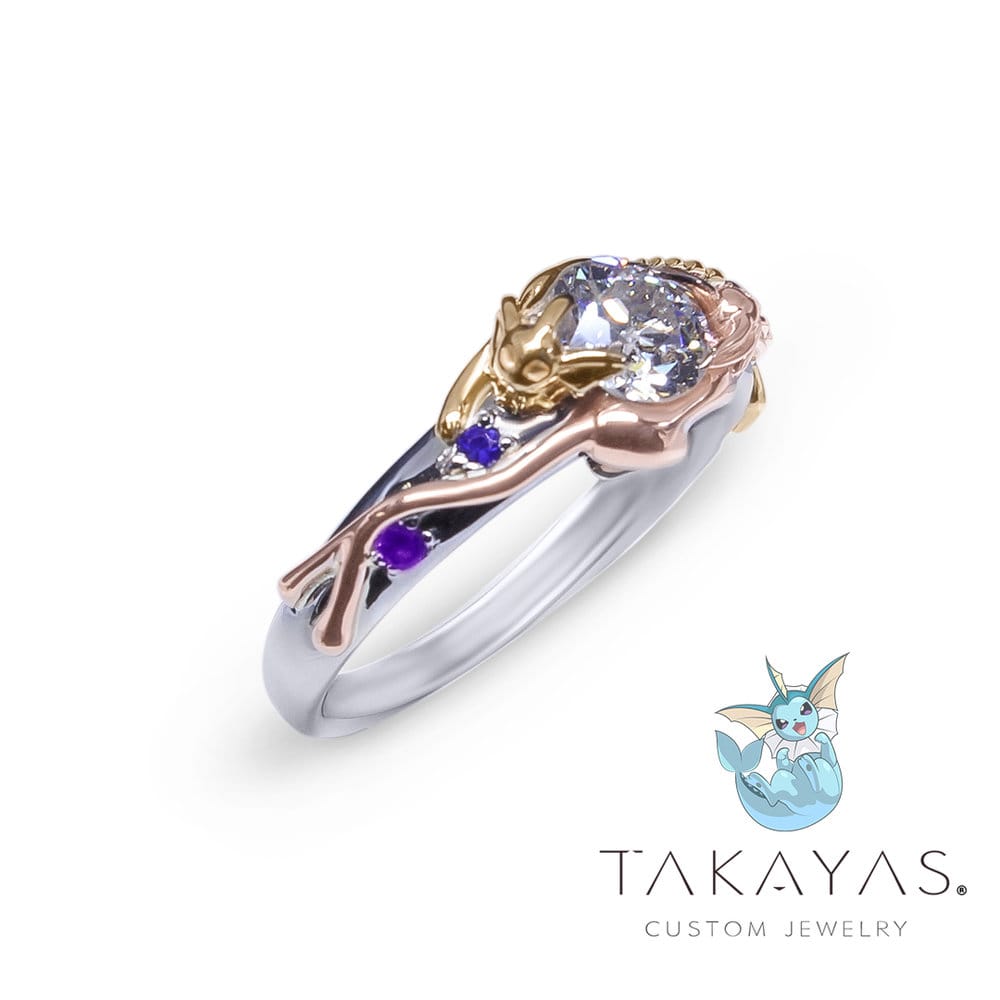 Read more about this Vaporeon and Espeon Pokemon inspired engagement ring on Takayas Custom Jewelry.