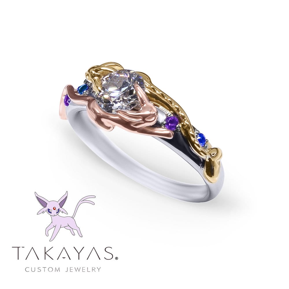 Read more about this Vaporeon and Espeon Pokemon inspired engagement ring on Takayas Custom Jewelry.