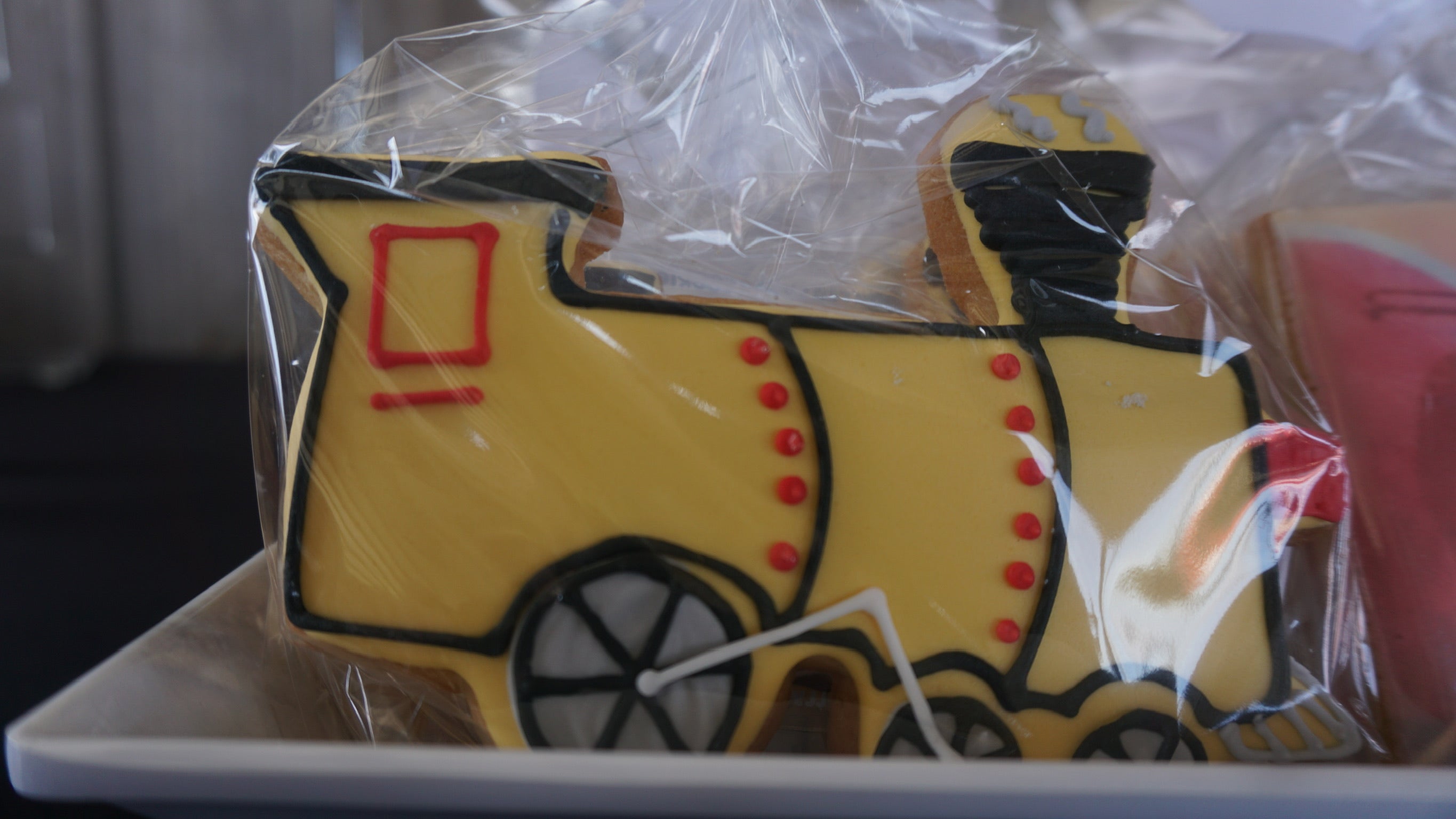 A photo of Really Good Cookie's train Custom Cookies for a retirement party favor. 