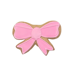 Pink Bow Cookie.png__PID:f27ea344-e2c3-47e9-826f-bea2147c3788