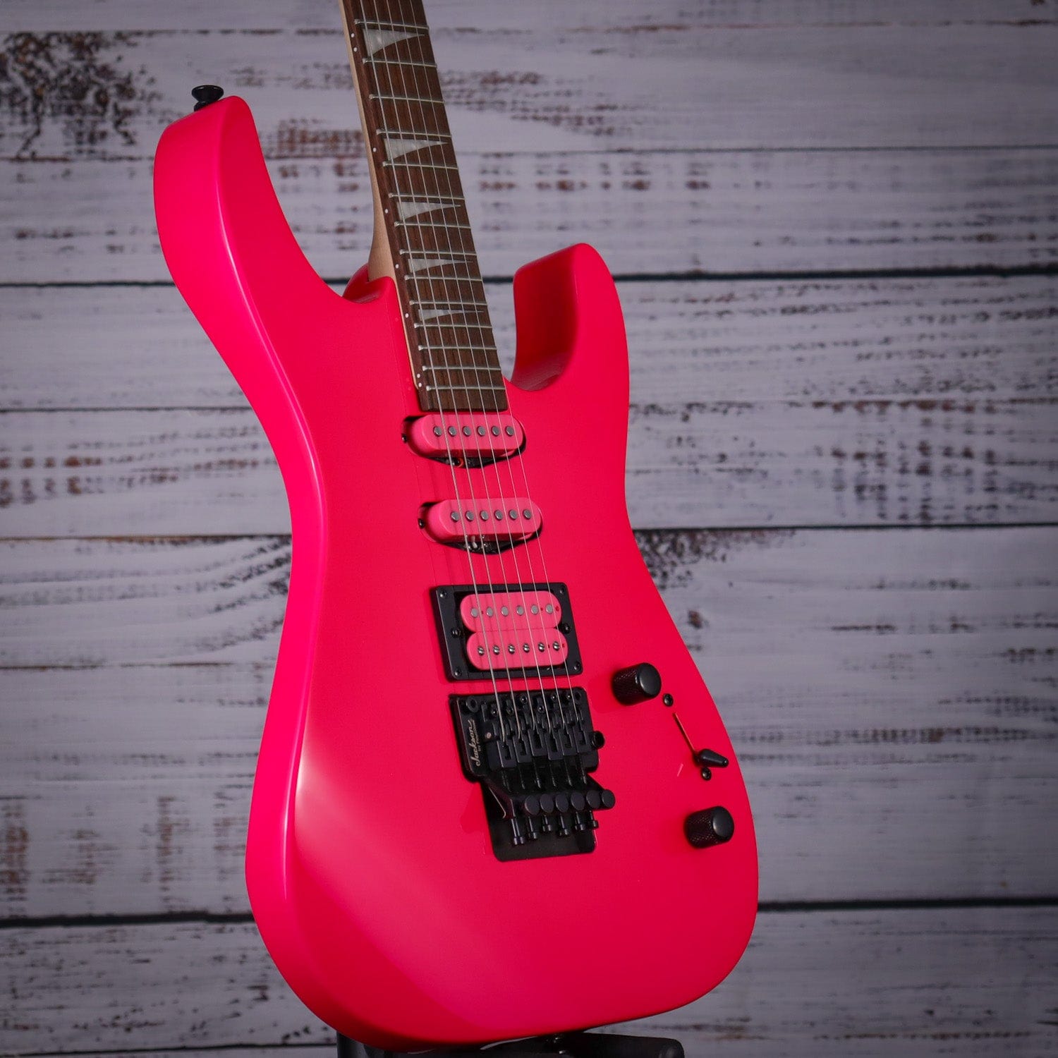 neon pink bass guitar