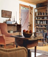 Living room with antique jugs