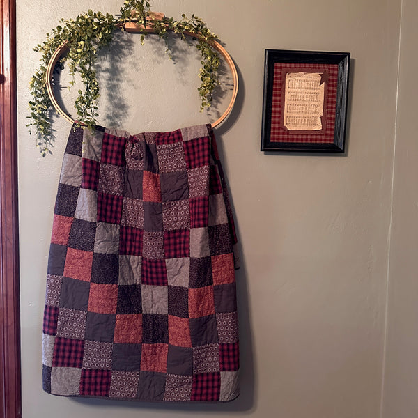 Quilt displayed in a quilt hoop