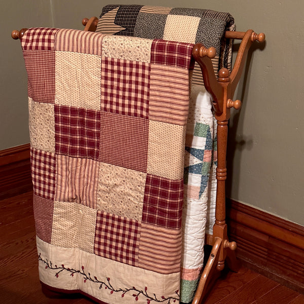 Quilts on a quilt stand