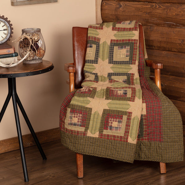 tea cabin quilted throw on chair