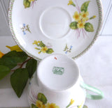 Shelley Cup And Saucer Primrose Cambridge Shape Green Handle Gold Trim 1950s