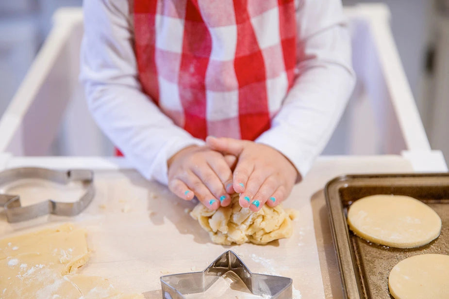 Learning to bake and cook helps enhance children's fine motor skills and sensory development