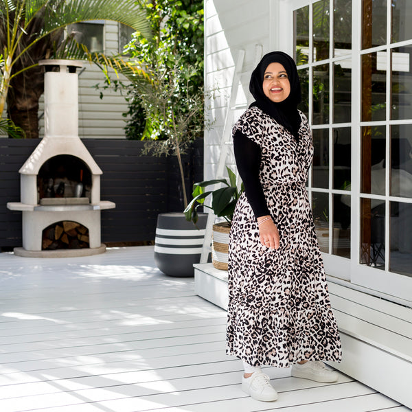 Faaiza wearing the whittney faux wrap dress in animal by Styling you the label