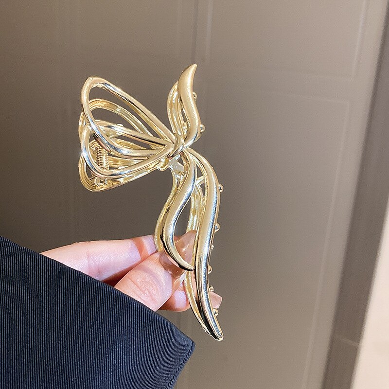 Product Image for Avelena | Perlen Lilie Haarklammern mit Schmetterlingsquaste, gold / CN / Haarspangen
