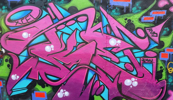 kever ones graffiti artist aerosol mural with spray paint