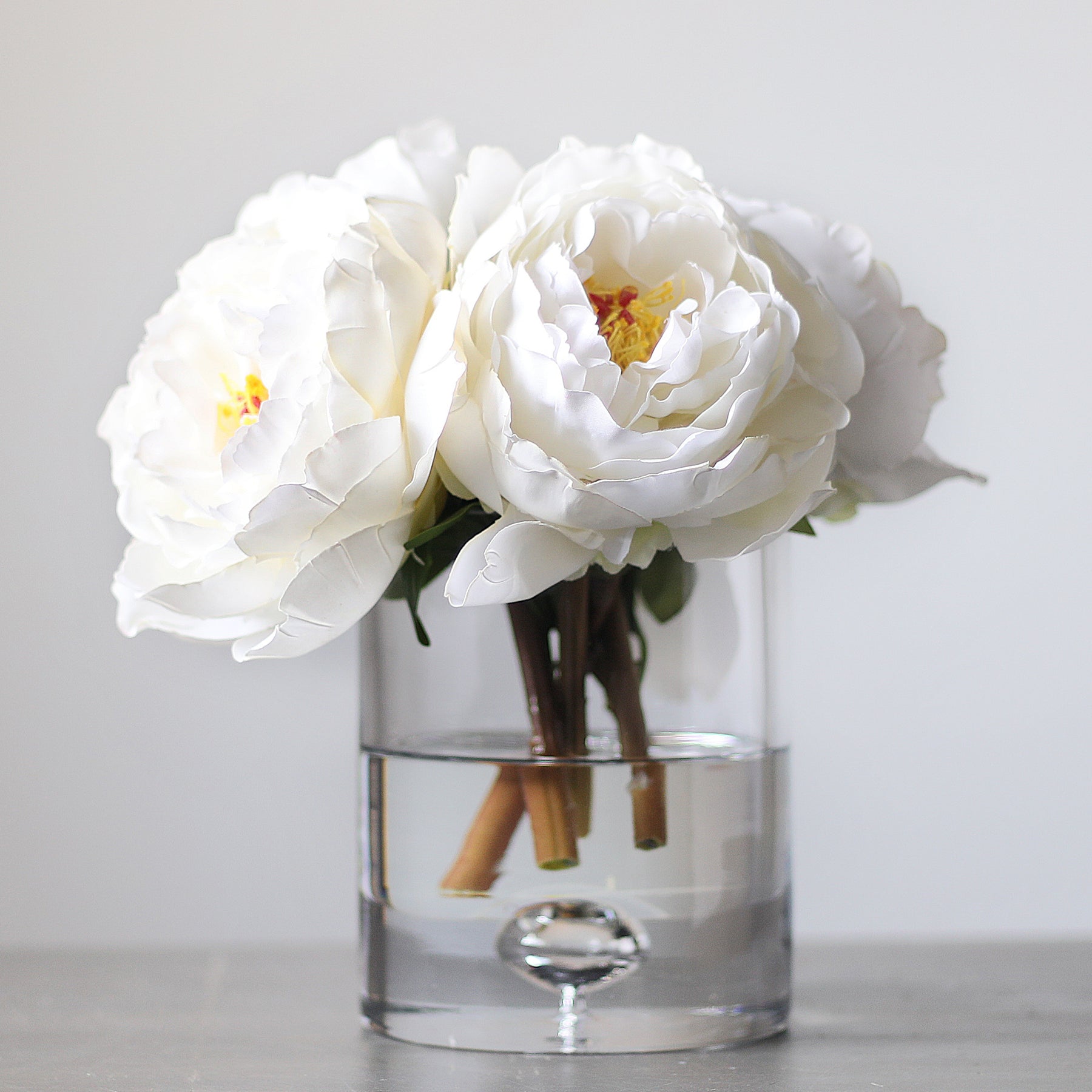 Lavender Real Touch Peony Floral Arrangement in Clear Glass Vase