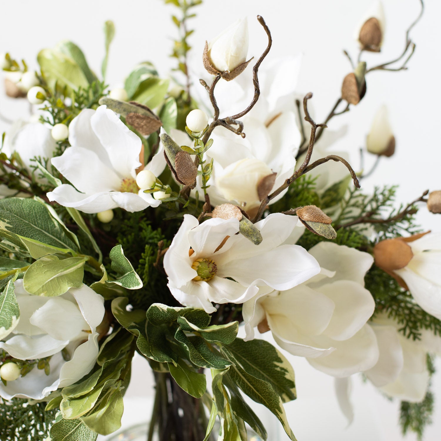 White Magnolia, Mixed Greens & Berry Everyday Winter Floral Arrangemen