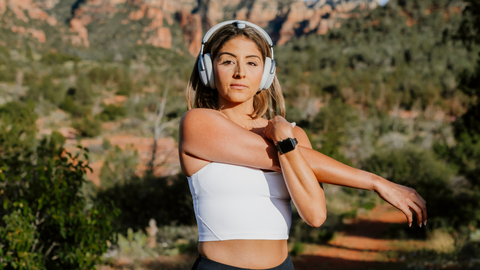 Women stretching while using Vital Headsets