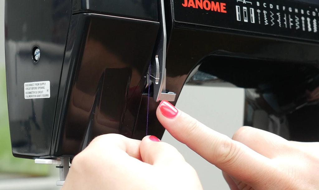 threading the tension of a janome HD1000BE sewing machine