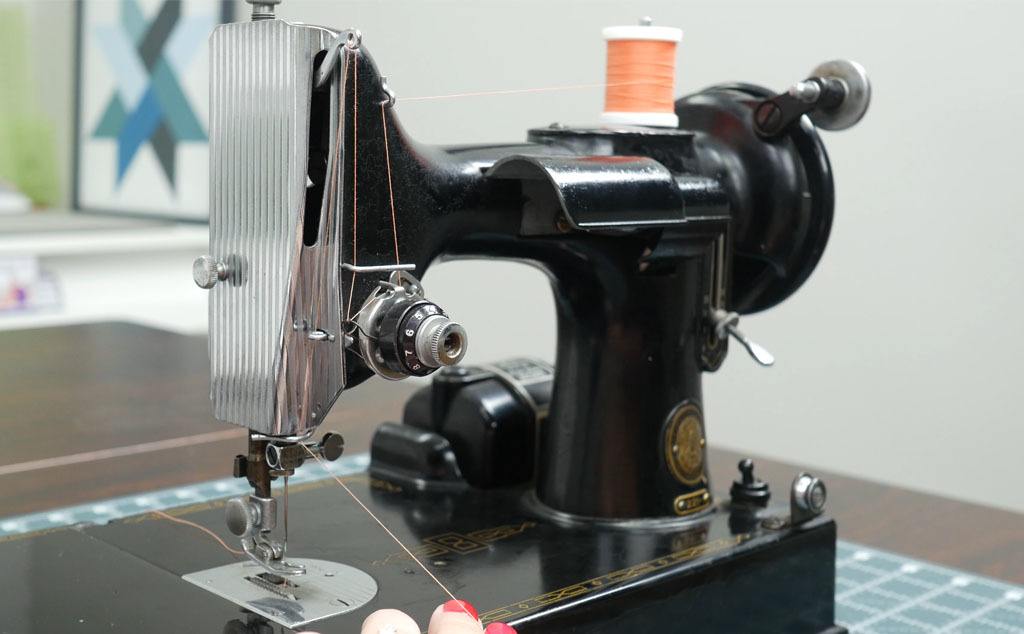 Threading the guides on a singer 221 sewing machine