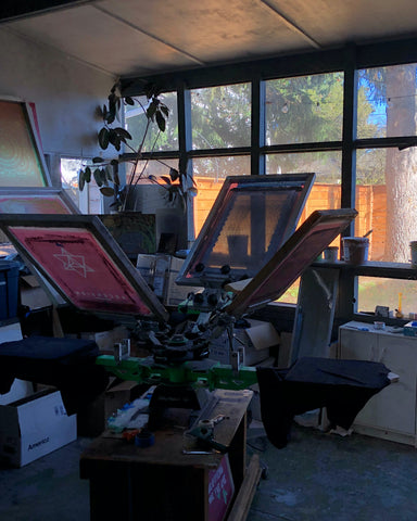 Rythmatix print shop in Portland, OR. Light streams in the window.
