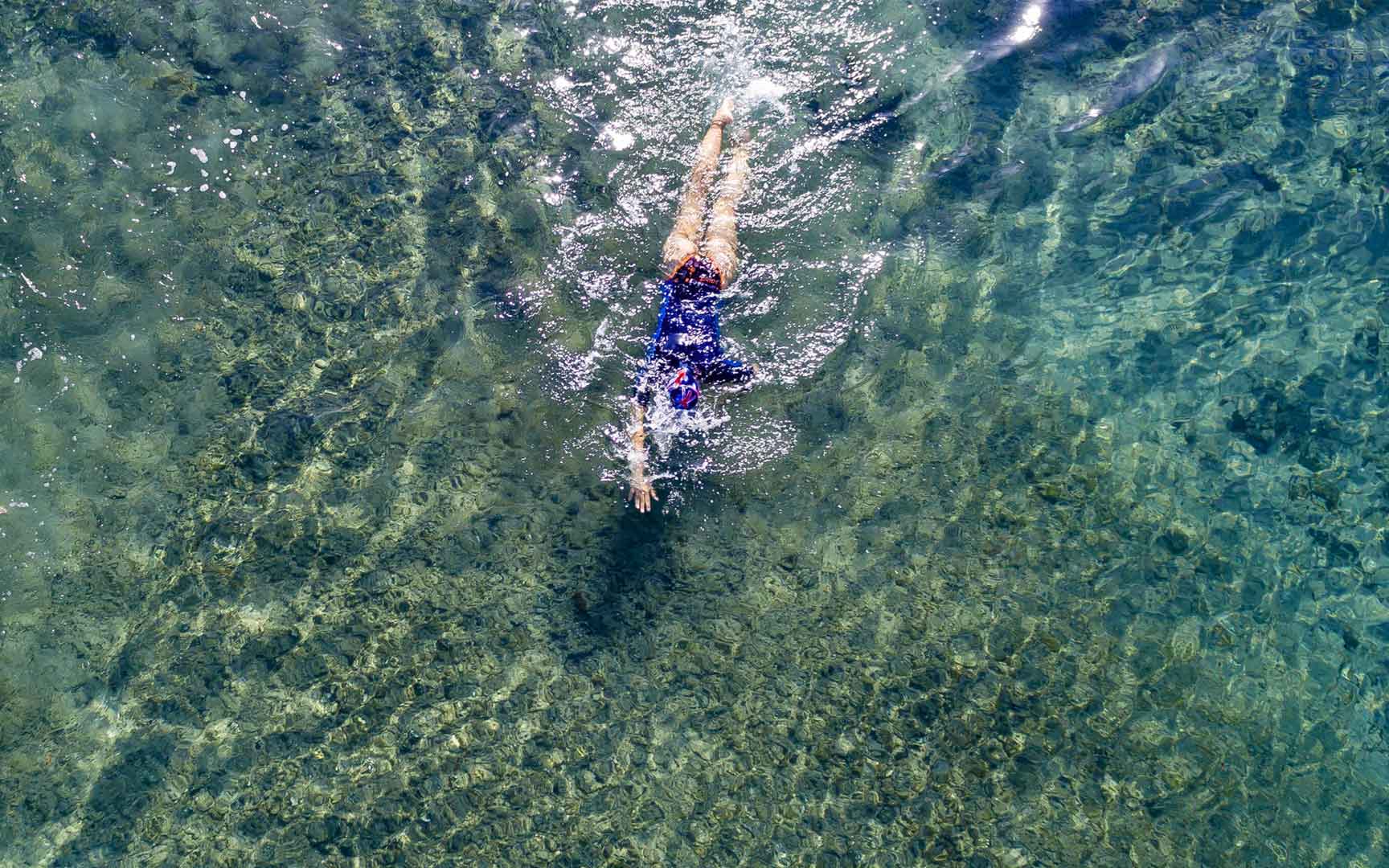 woman swimming in ocean