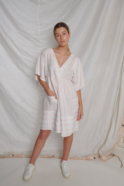 White linen knee-length dress with V-neckline, short sleeves and pink stripes