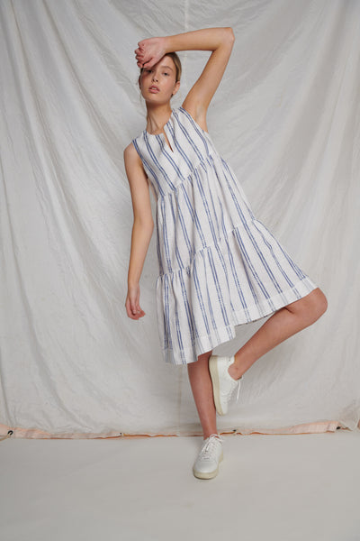 White linen knee-length and sleeveless dress with blue stripes