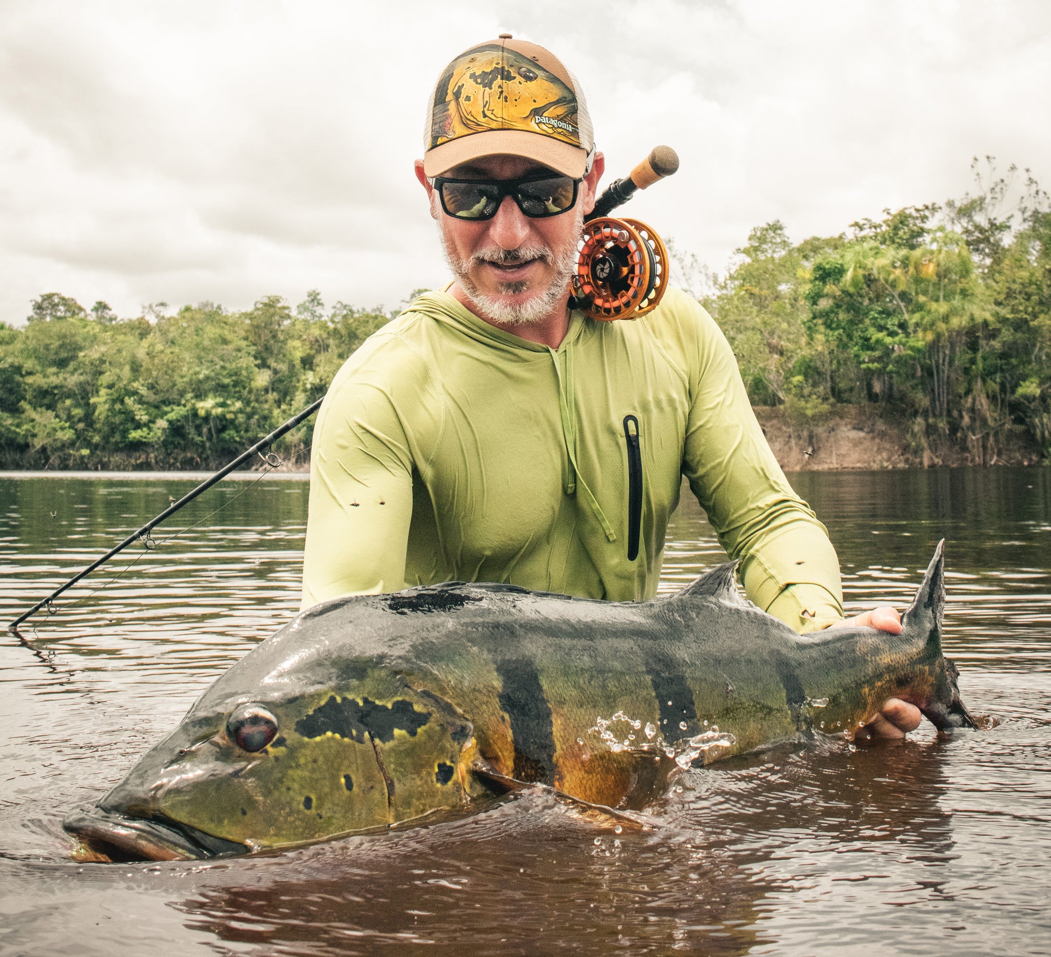 Fly fish angler reels in potential world-record blue catfish in