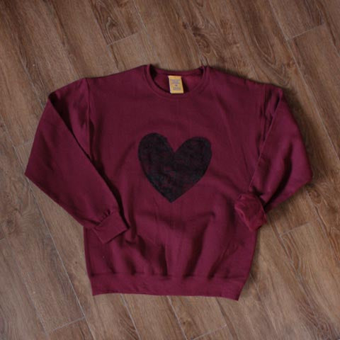 eco-conscious heart sweater