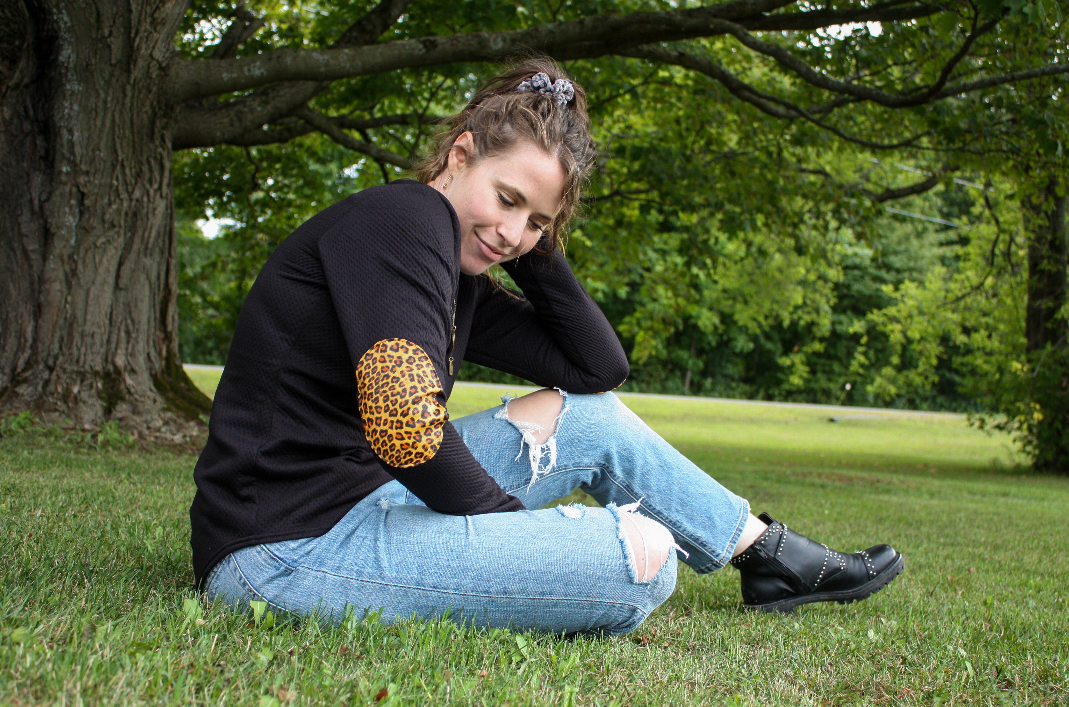 black fitted sweater with leopard print faux leather elbow patches, handmade in Ottawa