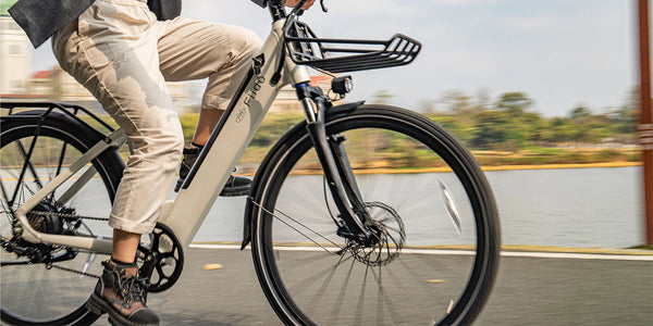 Woman riding fiido c11 ebike by the lake