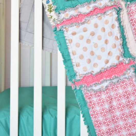 coral and teal floral crib bedding