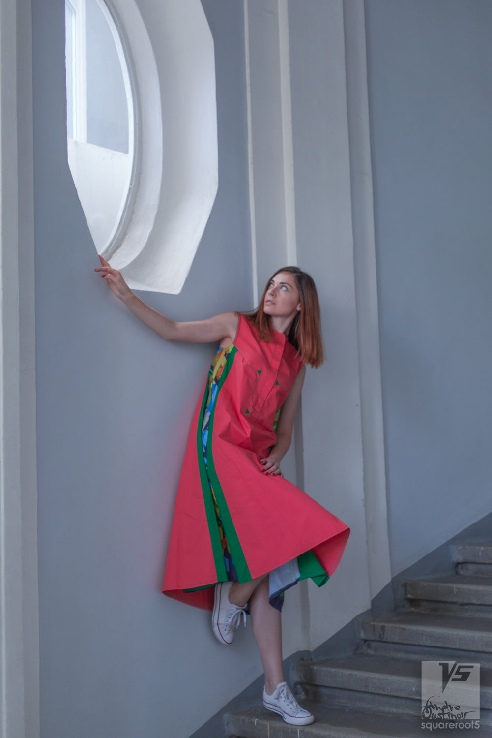 Long avant-garde long geometric dress "Cosmic tetris" model "Orange Green" Designer dresses for creative women by Squareroot5 wear . Architectural Institute shot. Interior