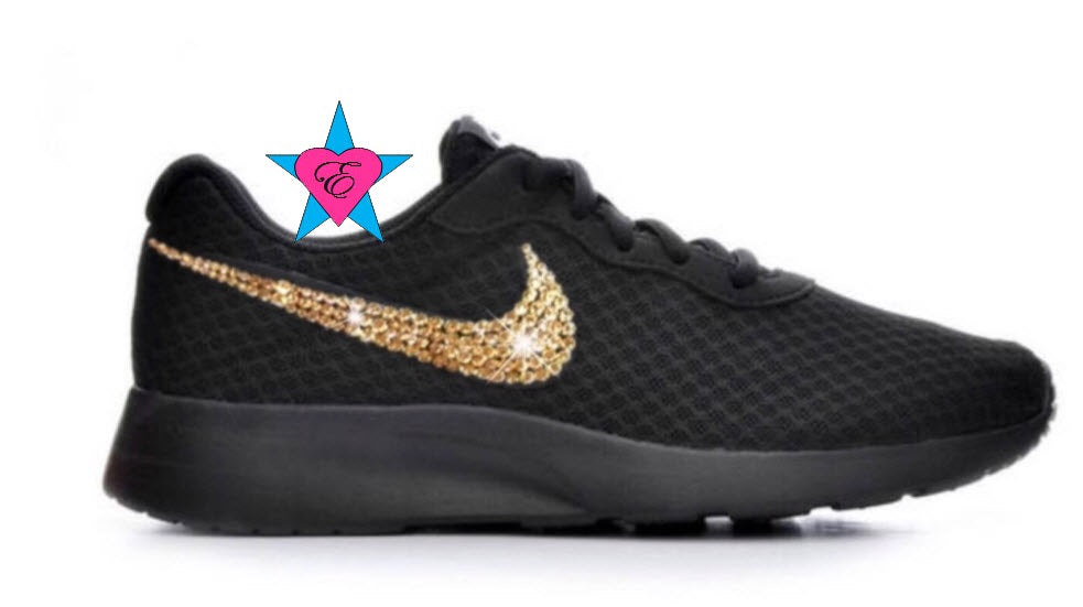 nike tanjun gold and black