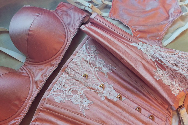Peach silk and ivory lace underbust corset with matching lingerie