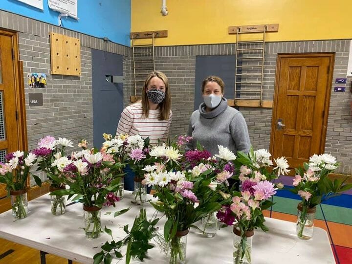 Mason Jar Lifestyle always donates to their local schools through the PTA for teacher appreciation and here is the PTA with flowers in frog lids