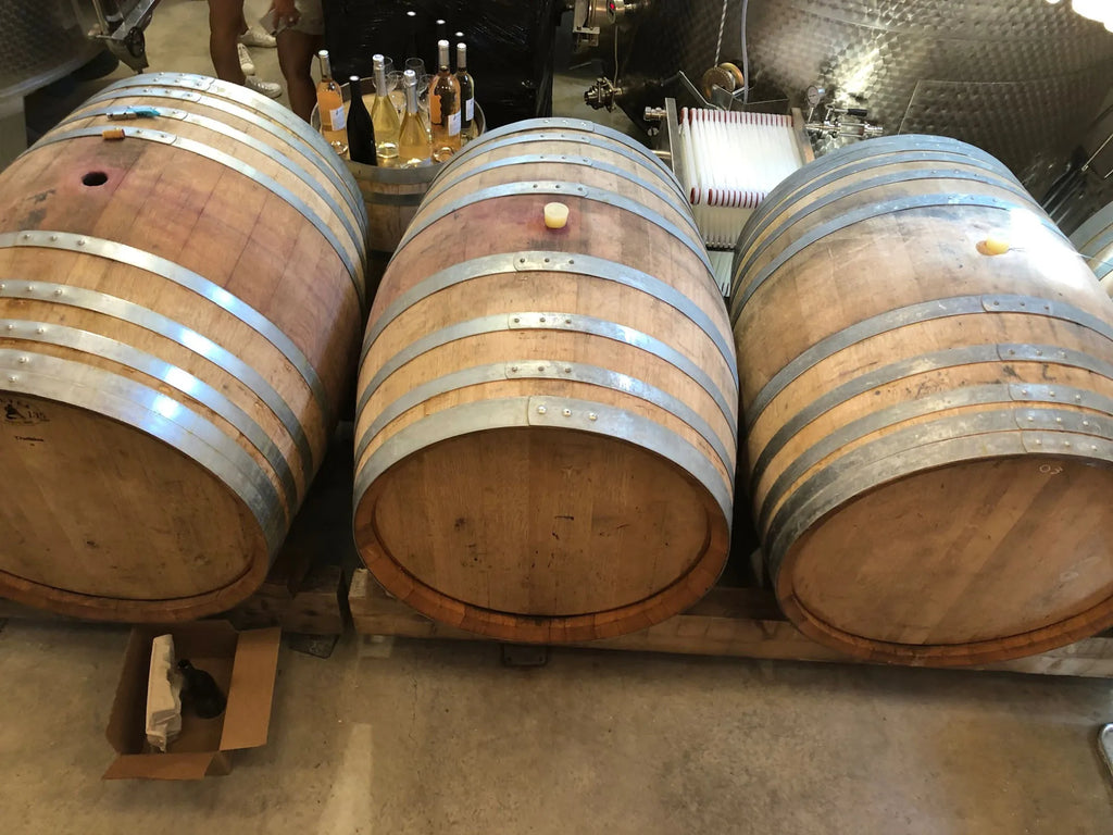 Wine Barrels in the Domaine Des Jeanne Cave