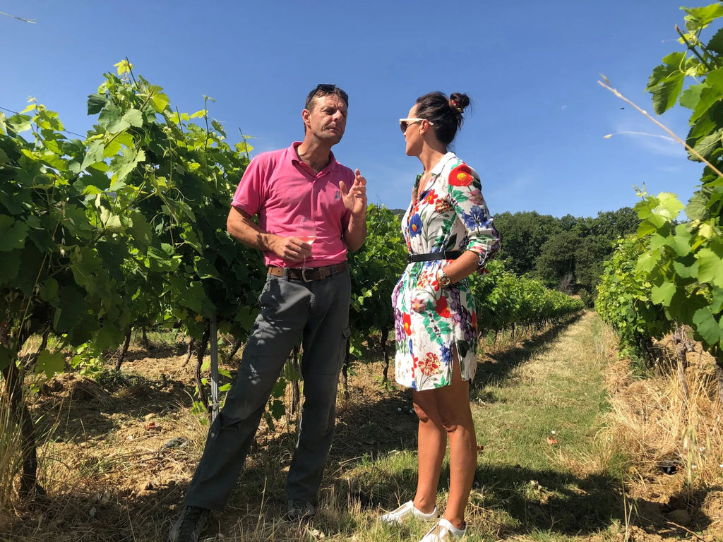 Discussing grapes at Domaine des Jeanne