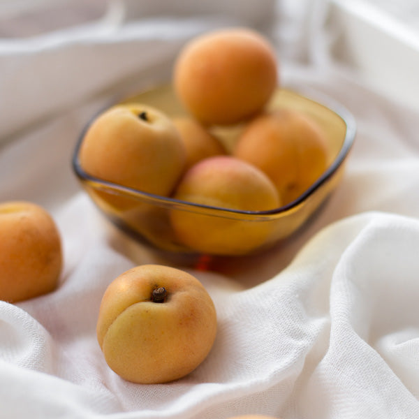 White Fabric with Apricots on top